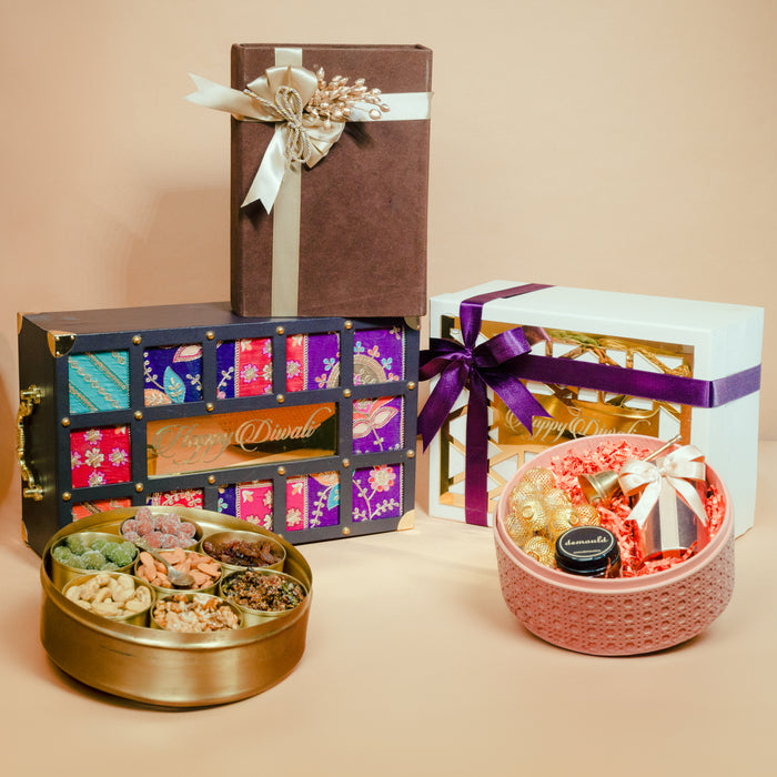 Diwali hamper collection with patola trunk, mithai tin and festive gift boxes, by Demould Delhi