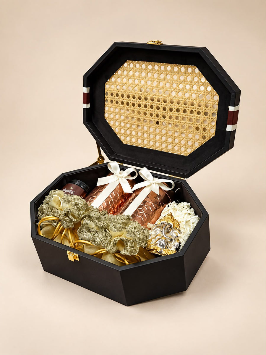Diwali hamper trays with decorative diyas, potli bags and festive jars, hand-packed by Demould Delhi