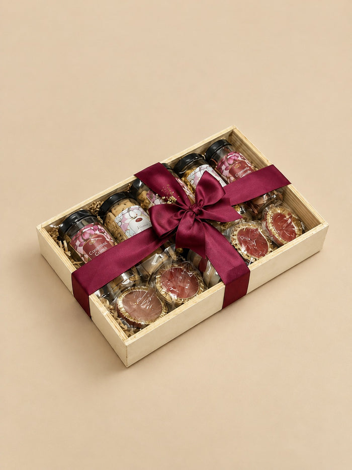 Wooden tray Diwali hamper with gourmet jars and red ribbon, freshly made by Demould Delhi